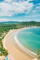 Beautiful view of San Juan del Sur beach in sunny day. Panoramic view of the bay of San Juan del Sur, Nicaragua photo