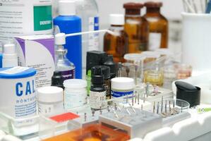 a tray with various medicines and other items photo