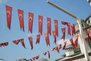 Low Angle View Of Turkish Flag Against Sky. photo