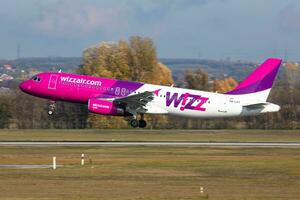 Wizz Air Airbus A320 HA-LPT passenger plane arrival and landing at Budapest Airport photo