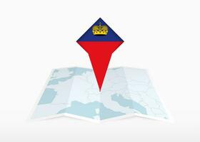 Liechtenstein is depicted on a folded paper map and pinned location marker with flag of Liechtenstein. vector