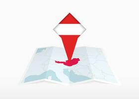 Austria is depicted on a folded paper map and pinned location marker with flag of Austria. vector