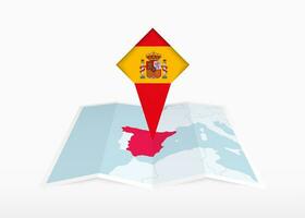 Spain is depicted on a folded paper map and pinned location marker with flag of Spain. vector
