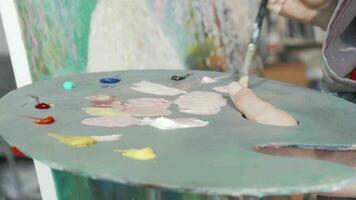 Cropped shot of a palette of a female painter video