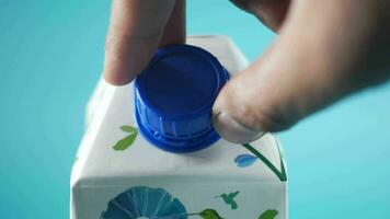 removing cap from a a milk container video