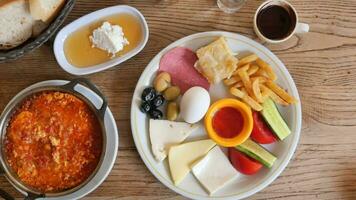 turkish breakfast of cheese, cucumber, egg, olive and tomato video