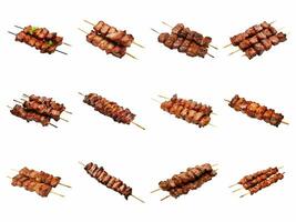 AI generated grilled pork meat on a stick collection isolated on white background. photo