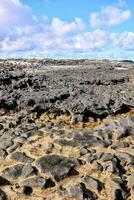 the lava fields of the isle of man photo