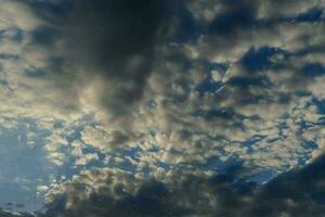 a large white cloud is in the sky photo