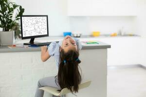 Little Girl Using Computer Concept, distance online learning photo