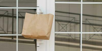 Delivery of food made during quarantine at Covid-19. Food delivered at home with a note photo