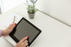 picture of happy woman with tablet pc computer photo