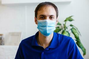 man wearing protective mask. coronavirus 2019-nCoV photo
