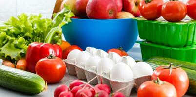 healthy food background, vegetables, fruits, eggs and dairy products on white table, top view photo