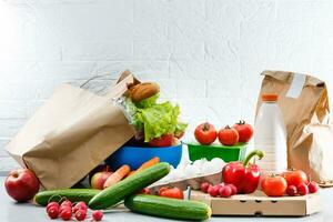 healthy food background, vegetables, fruits, eggs and dairy products on white table, top view photo