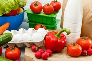 healthy food background, vegetables, fruits, eggs and dairy products on white table, top view photo