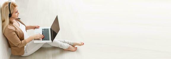 Creative workspace, woman working online on laptop at home photo