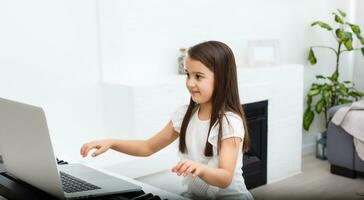 Pretty young musician playing classic digital piano at home during online class at home, social distance during quarantine, self-isolation, online education concept photo