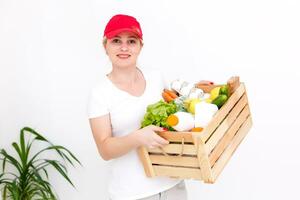 Woman delivering parcel, delivery of products photo