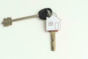 House keys with keychain. Isolated on white background photo
