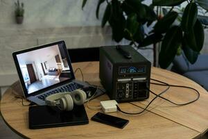 Desktop with a computer screen, keyboard, mouse, and headphone photo