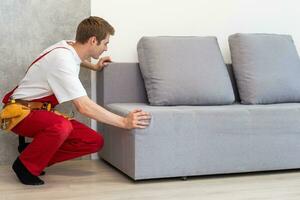 the master of sofa and bed maintenance repairs the mechanisms of the storage box photo