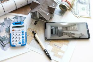 Architecture blueprint and work tool on table photo