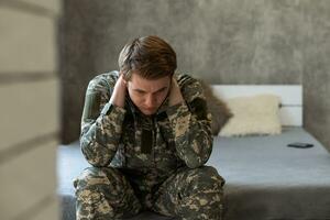 a military man in his thoughts photo