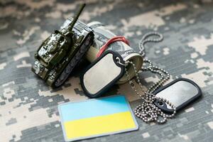 Military uniform with Ukrainian flag patch photo