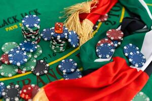 Gambling online casino Internet betting concept green screen. smartphone with poker chips, dice. Jackpot, casino chips. photo