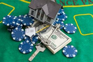 Poker playing chips with card and dollar banknoteson a casino green table. Online gambling. Texas photo