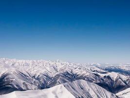 Breathtaking view of a snowy mountain range AI Generative photo