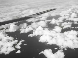 view from airplane with clouds and airplane wing AI Generative photo