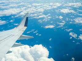 view from airplane with clouds and airplane wing AI Generative photo