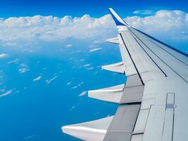view from airplane with clouds and airplane wing AI Generative photo