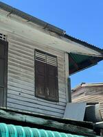 wooden roof in the city of thailand photo