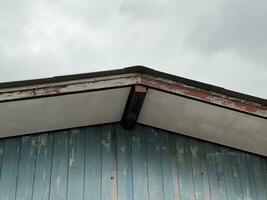 old wooden home with blue sky background photo