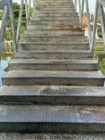 metal walkway in a park. photo