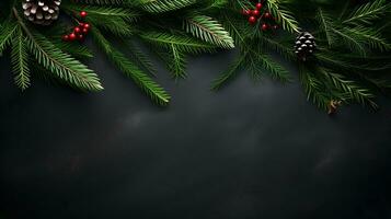 Christmas background with xmas tree and fir cones on black background. Space for text. photo