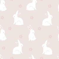 Cute hand-drawn seamless pattern with rabbits and flowers vector