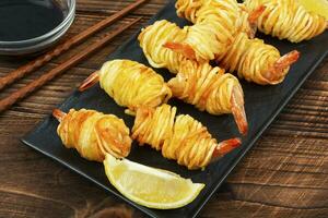 Grilled shrimp potato rolls. photo