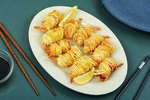 Grilled shrimp potato rolls. photo