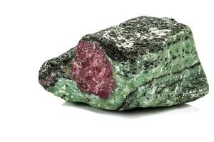 Macro of mineral stone ruby in rock on white background photo