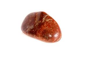 Macro mineral stone jasper on a white background photo