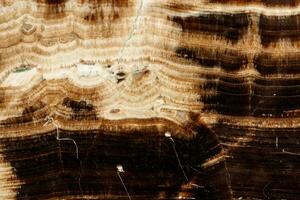 Macro stone mineral onyx marble on a black background photo