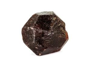 macro mineral stone  Garnet, on a white background photo