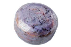 Macro of mineral Corundum Ruby Sapphire on white background photo