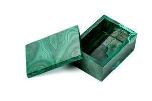 macro malachite boxes on white background photo
