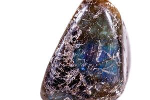 Macro mineral stone Labradorite on white background photo