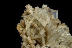 Macro mineral stone fluorite with quartz against black background photo